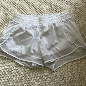 White Athleta mesh racer run shorts 4 inch